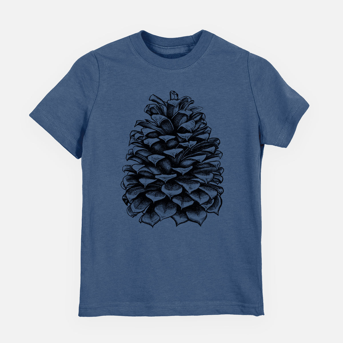 Indigo blue youth t-shirt laid flat, printed with a detailed black ink illustration of a large Jeffrey pine cone.