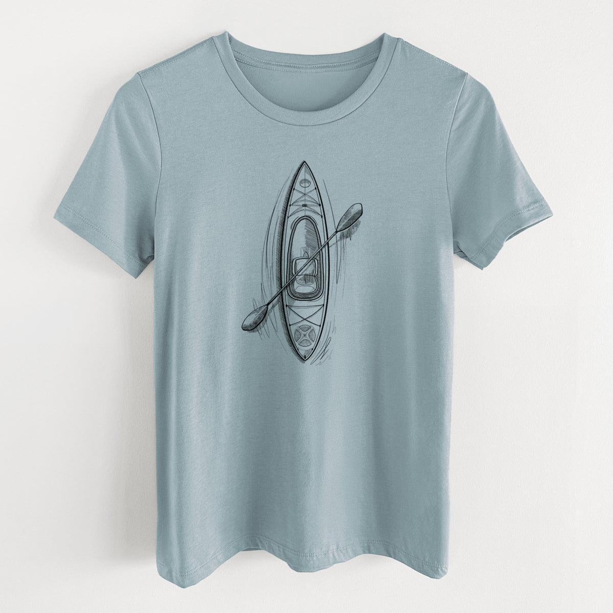 Vintage denim women's relaxed fit cotton t-shirt laid flat, printed with a black ink illustration of a kayak with a paddle, seen from above.