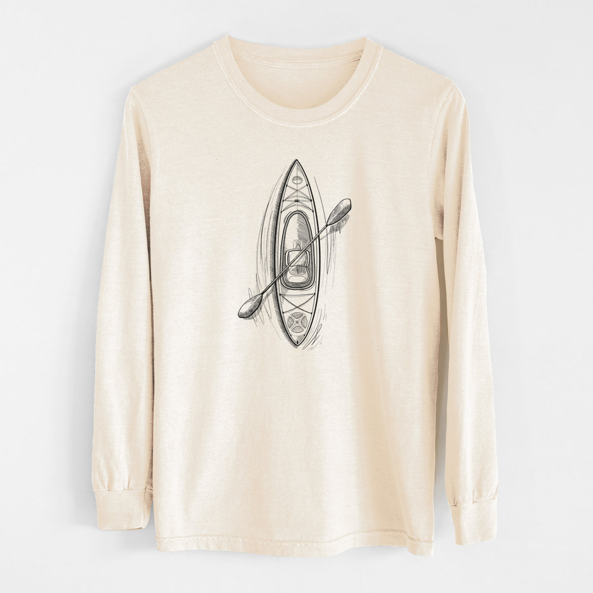 Ivory Comfort Colors long sleeve shirt laid flat, printed with a black ink illustration of a kayak with a paddle, seen from above.