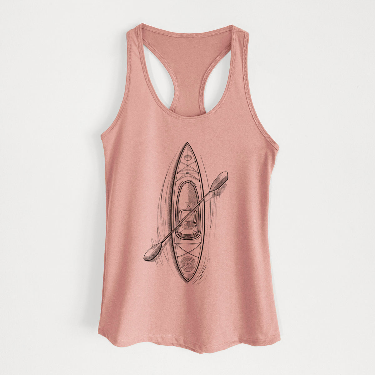 Desert pink women's racerback tank top laid flat, printed with a black ink illustration of a kayak with a paddle, seen from above.