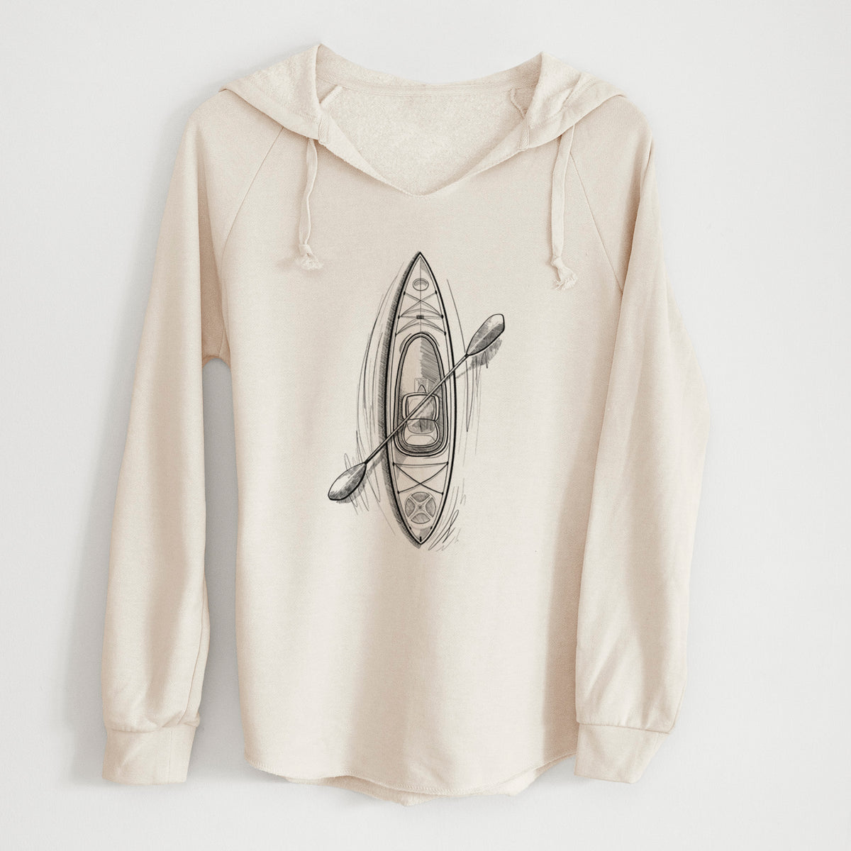 Bone cream women's Cali Wave hooded sweatshirt laid flat, printed with a black ink illustration of a kayak with a paddle, seen from above.