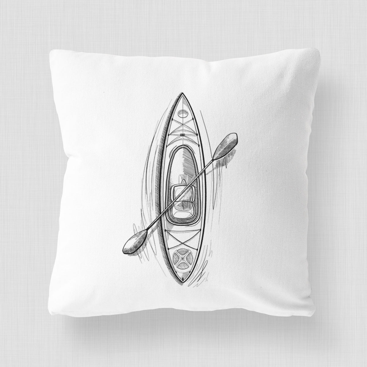 White pillow cover printed with a black ink illustration of a kayak with a paddle, seen from above.