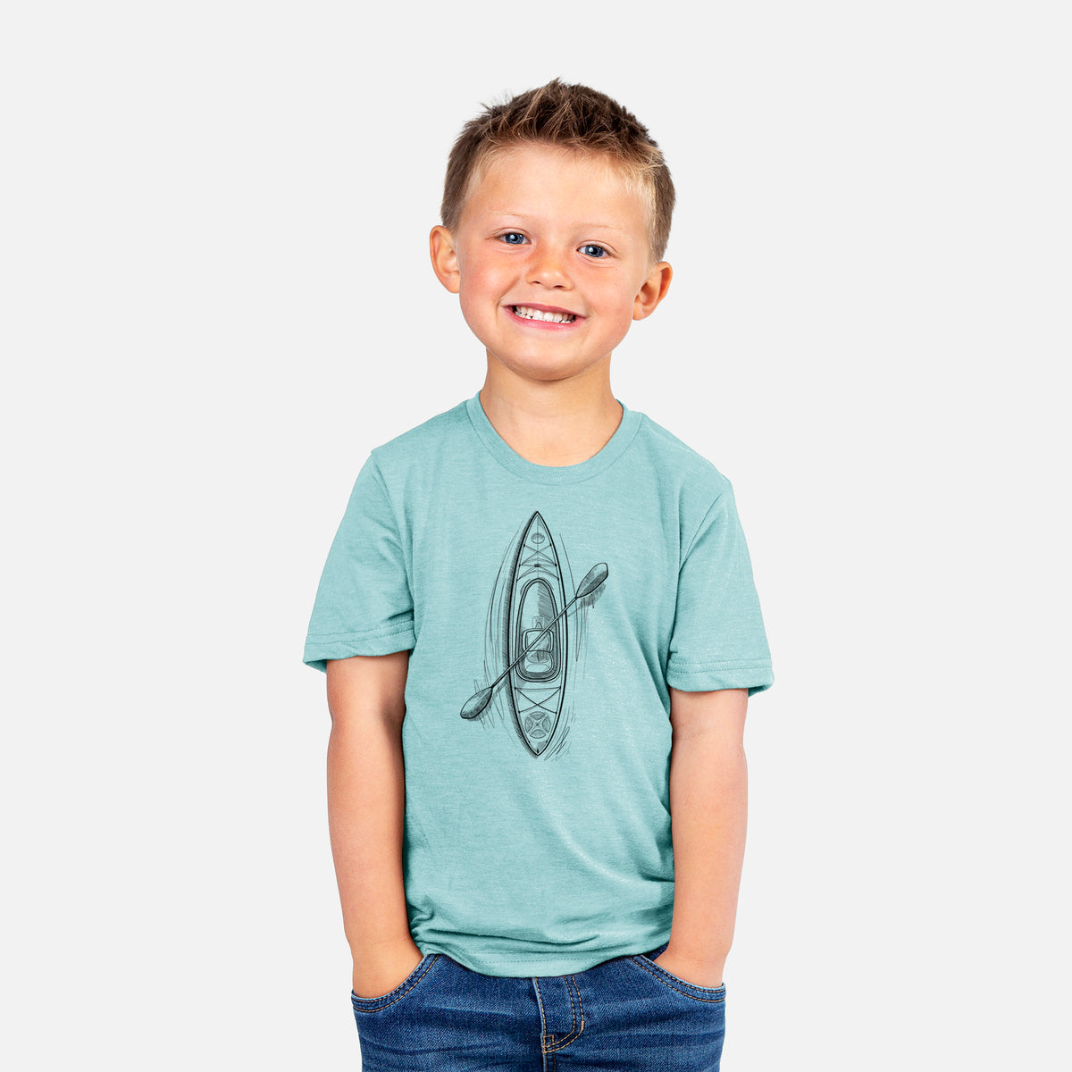 Smiling boy wearing a youth t-shirt printed with a black ink illustration of a kayak with a paddle, seen from above.