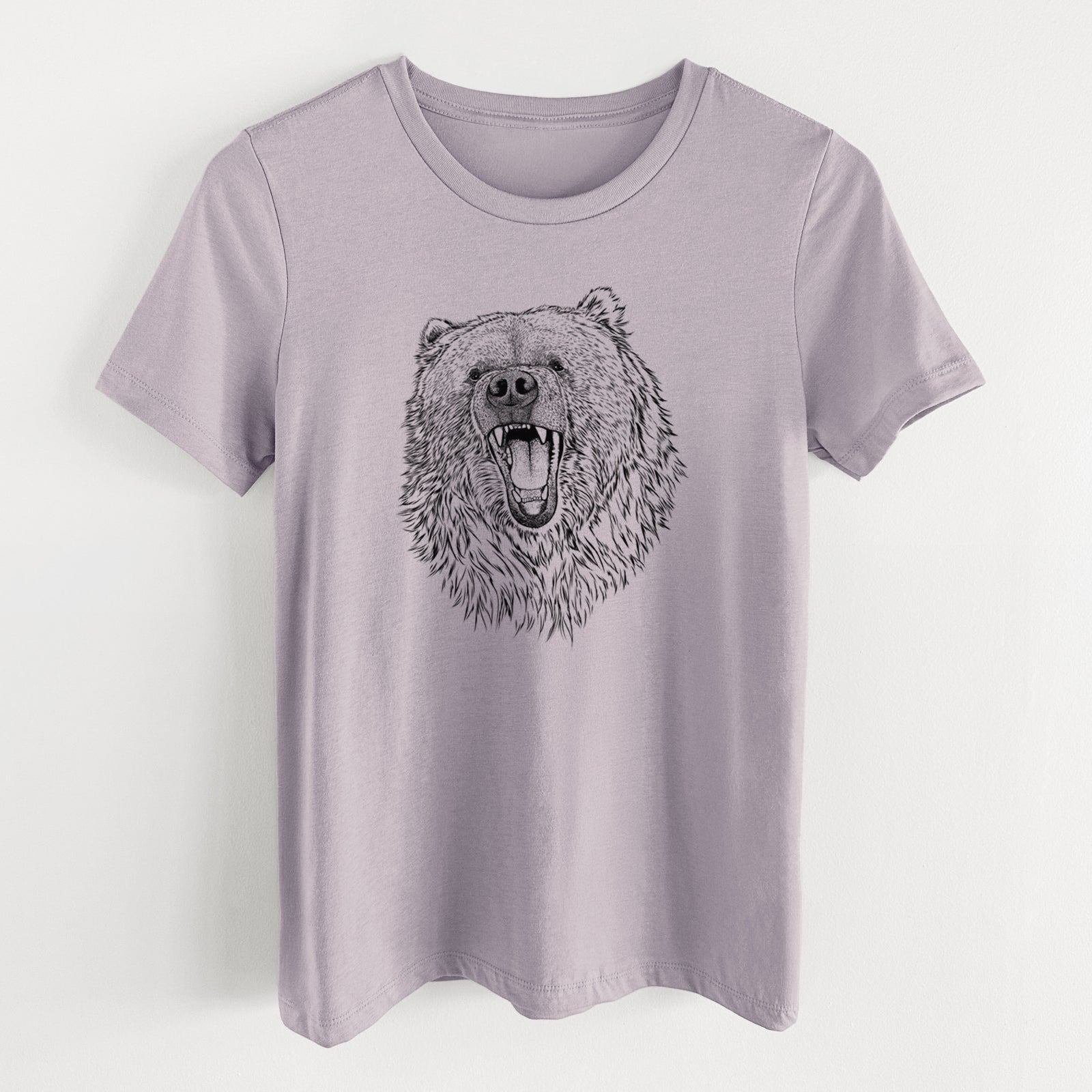 Light violet women's relaxed fit cotton t-shirt laid flat, printed with a detailed black ink portrait of a roaring Kodiak bear facing forward.