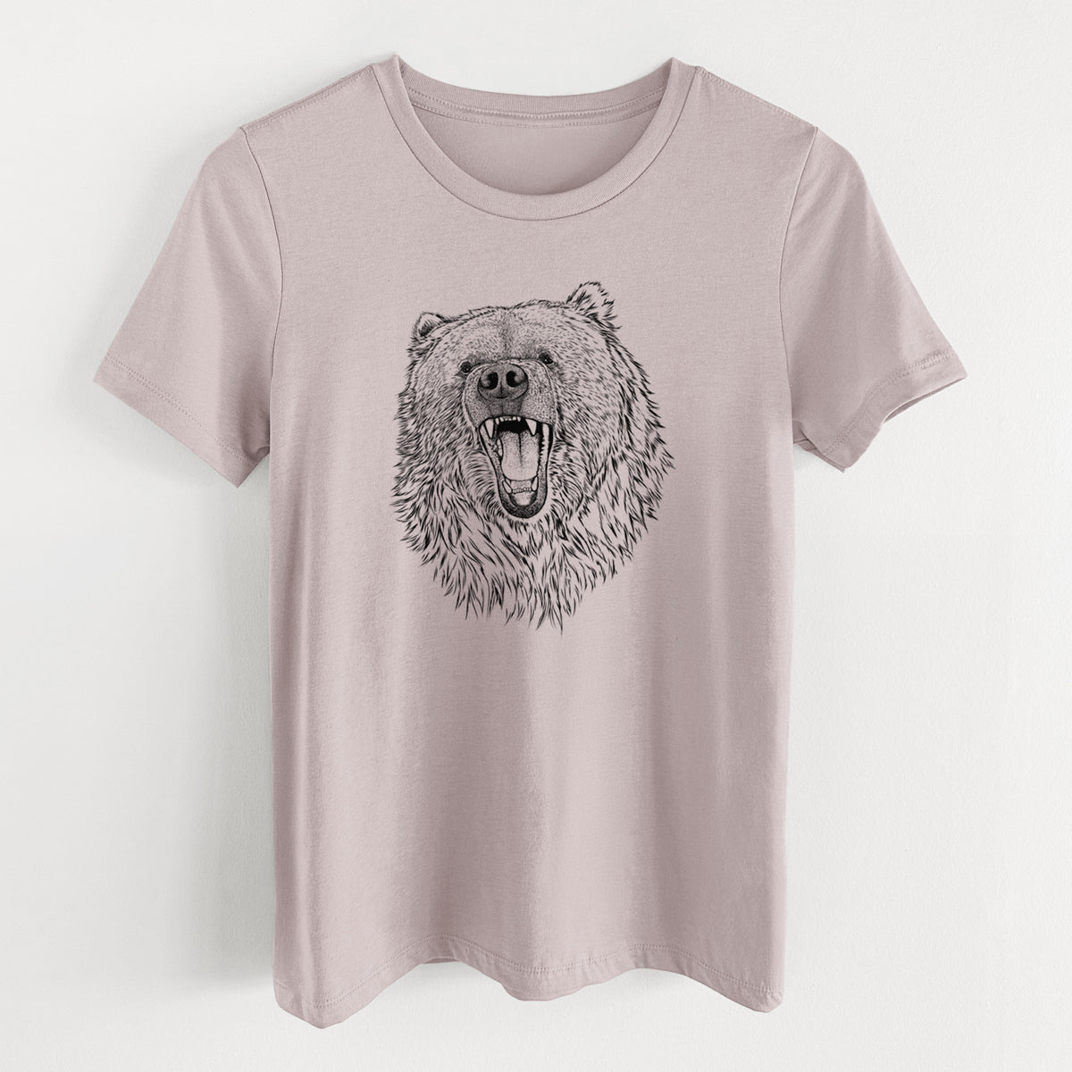 Pink gravel women's relaxed fit cotton t-shirt laid flat, printed with a detailed black ink portrait of a roaring Kodiak bear facing forward.