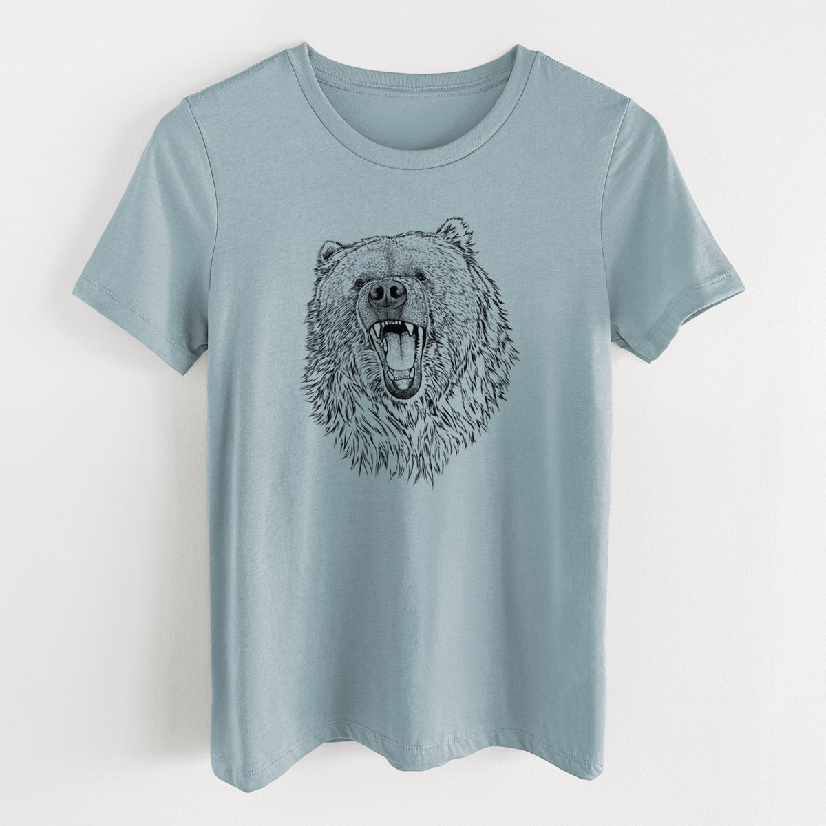 Vintage denim women's relaxed fit cotton t-shirt laid flat, printed with a detailed black ink portrait of a roaring Kodiak bear facing forward.