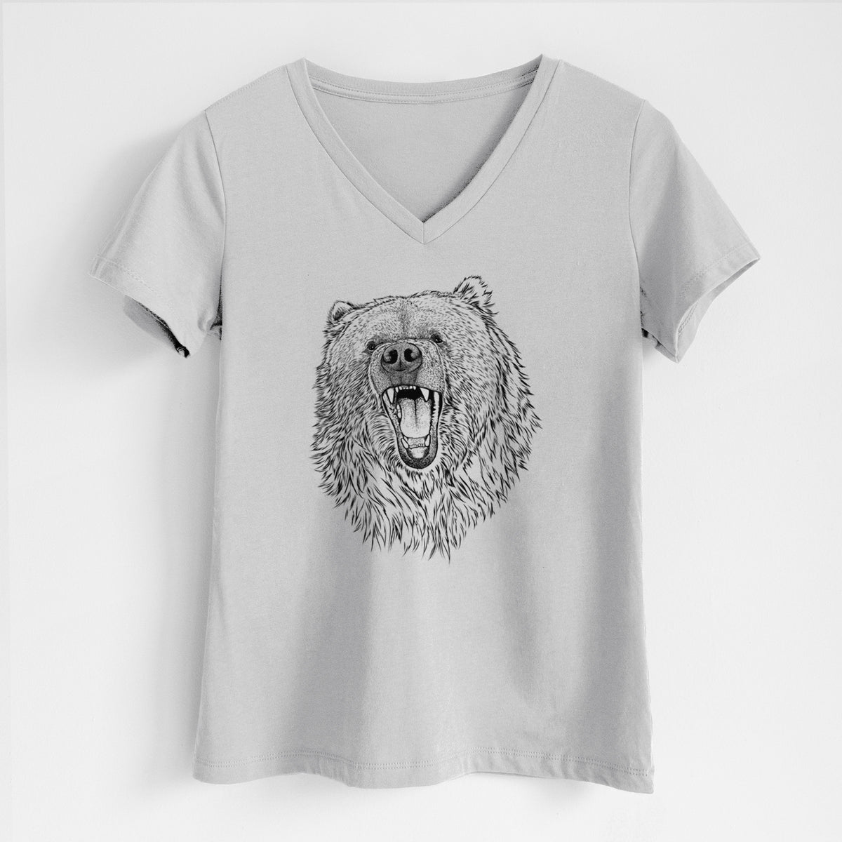 Lunar grey women's relaxed fit cotton V-neck t-shirt laid flat, printed with a detailed black ink portrait of a roaring Kodiak bear facing forward.