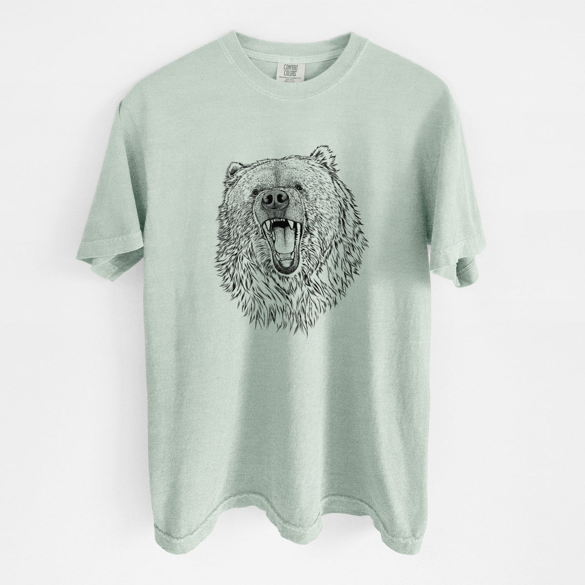 Bay green Comfort Colors t-shirt laid flat, printed with a detailed black ink portrait of a roaring Kodiak bear facing forward.