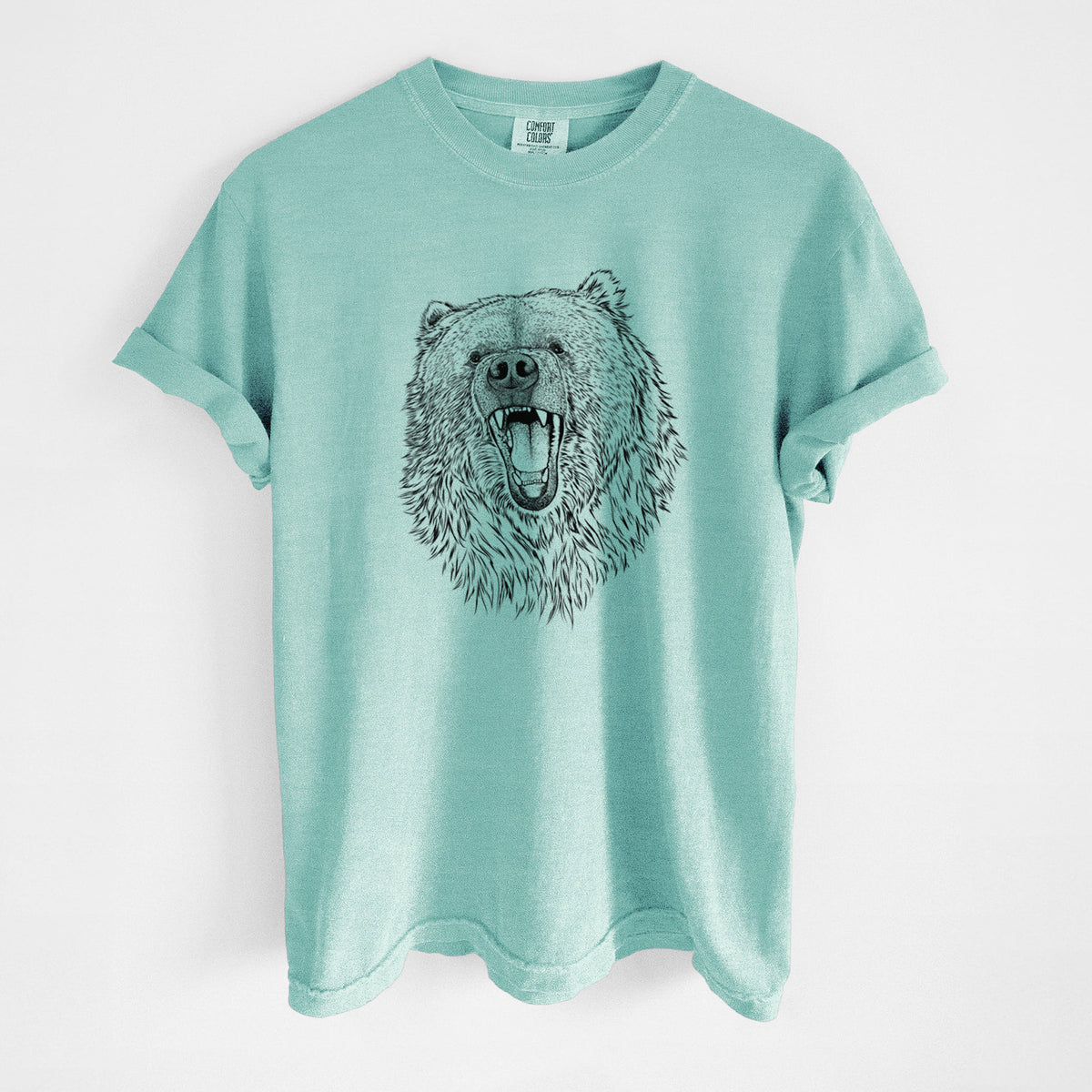 Chalky mint Comfort Colors t-shirt laid flat, printed with a detailed black ink portrait of a roaring Kodiak bear facing forward.