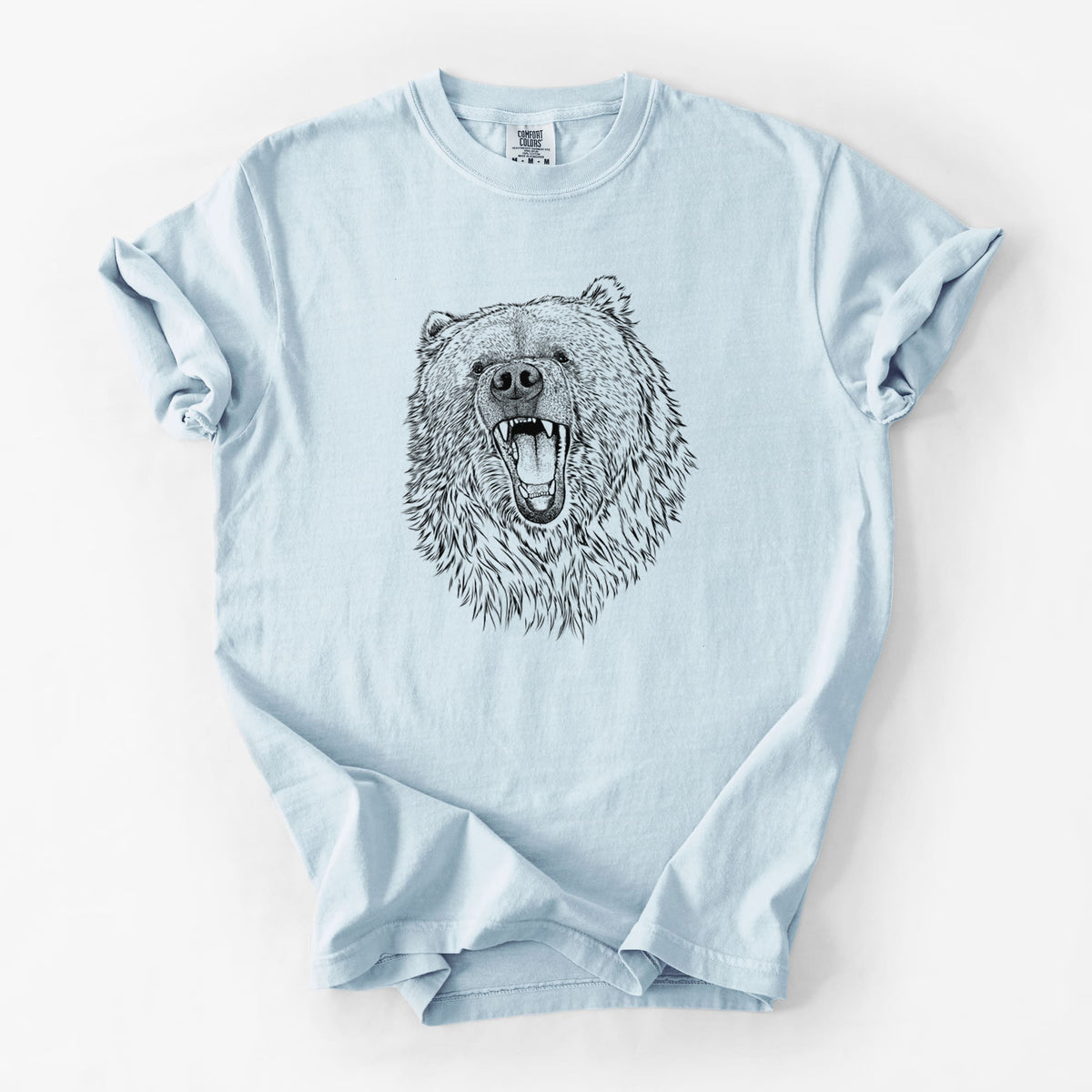 Chambray blue Comfort Colors t-shirt laid flat, printed with a detailed black ink portrait of a roaring Kodiak bear facing forward.