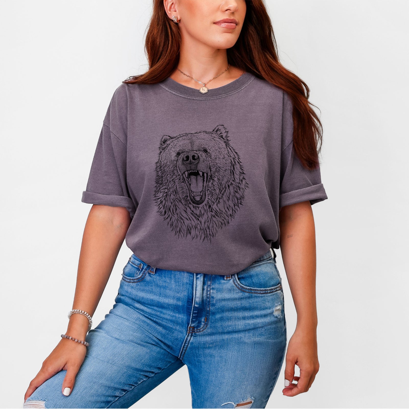 Blue jean Comfort Colors t-shirt laid flat, printed with a detailed black ink portrait of a roaring Kodiak bear facing forward.