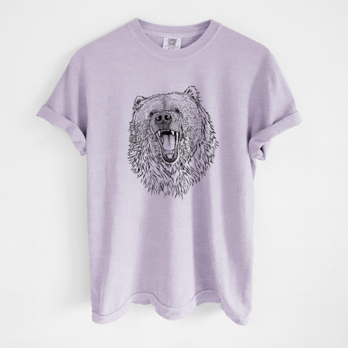Orchid purple Comfort Colors t-shirt laid flat, printed with a detailed black ink portrait of a roaring Kodiak bear facing forward.