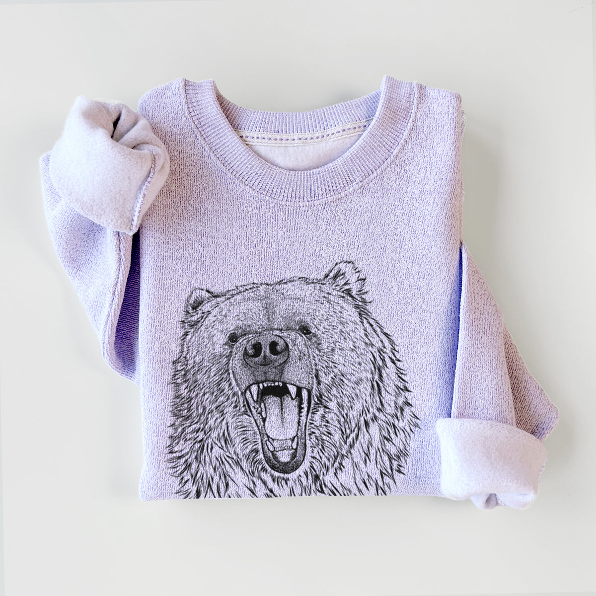 Ice purple knit sweatshirt printed with a detailed black ink portrait of a roaring Kodiak bear facing forward, styled flat.