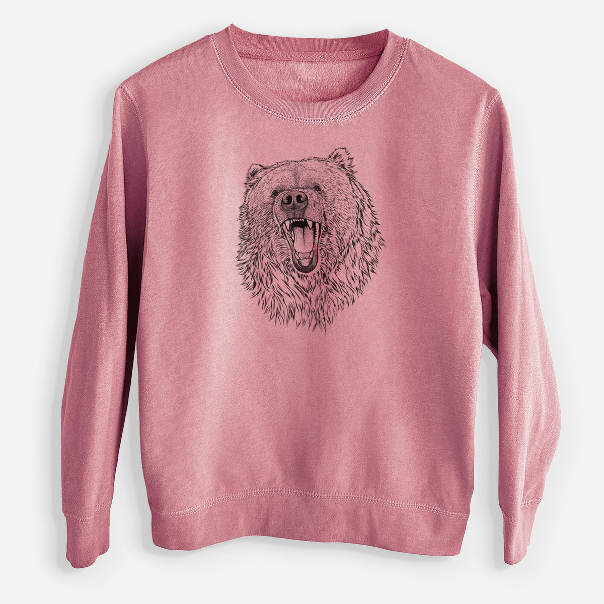 Mauve pink youth crewneck sweatshirt laid flat, printed with a detailed black ink portrait of a roaring Kodiak bear facing forward.