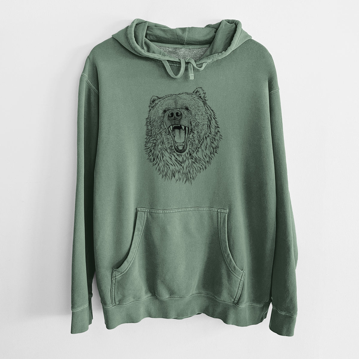 Alpine green pigment dyed hoodie laid flat, printed with a detailed black ink portrait of a roaring Kodiak bear facing forward.