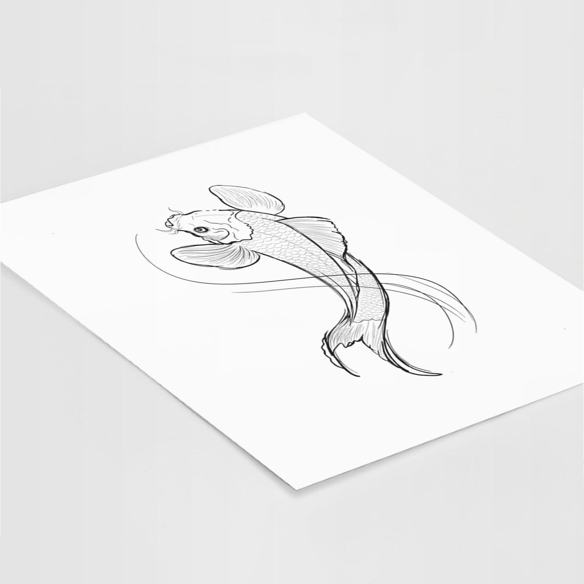 Art print of a black ink line drawing of a koi fish swimming with flowing fins, lying at an angle on a white surface.