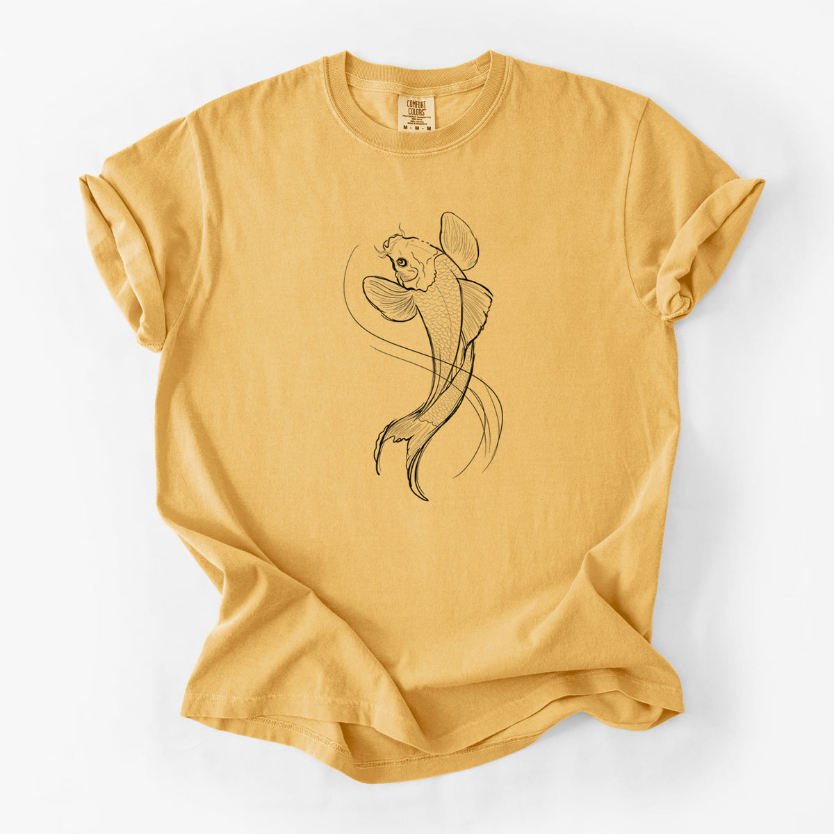 Golden wheat yellow Comfort Colors t-shirt laid flat, printed with a black ink line drawing of a koi fish swimming with flowing fins.
