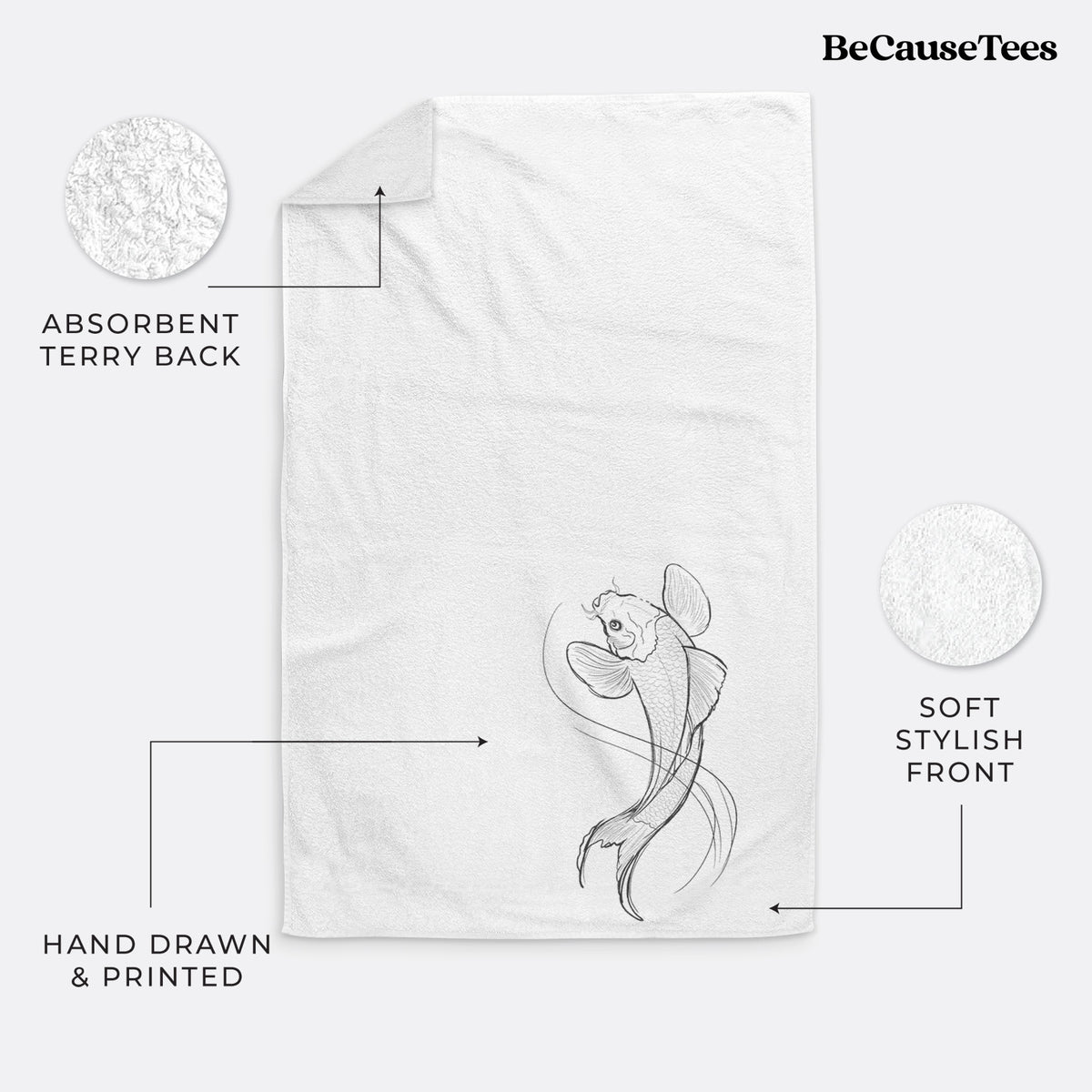 White hand towel printed with a black ink line drawing of a koi fish swimming with flowing fins.