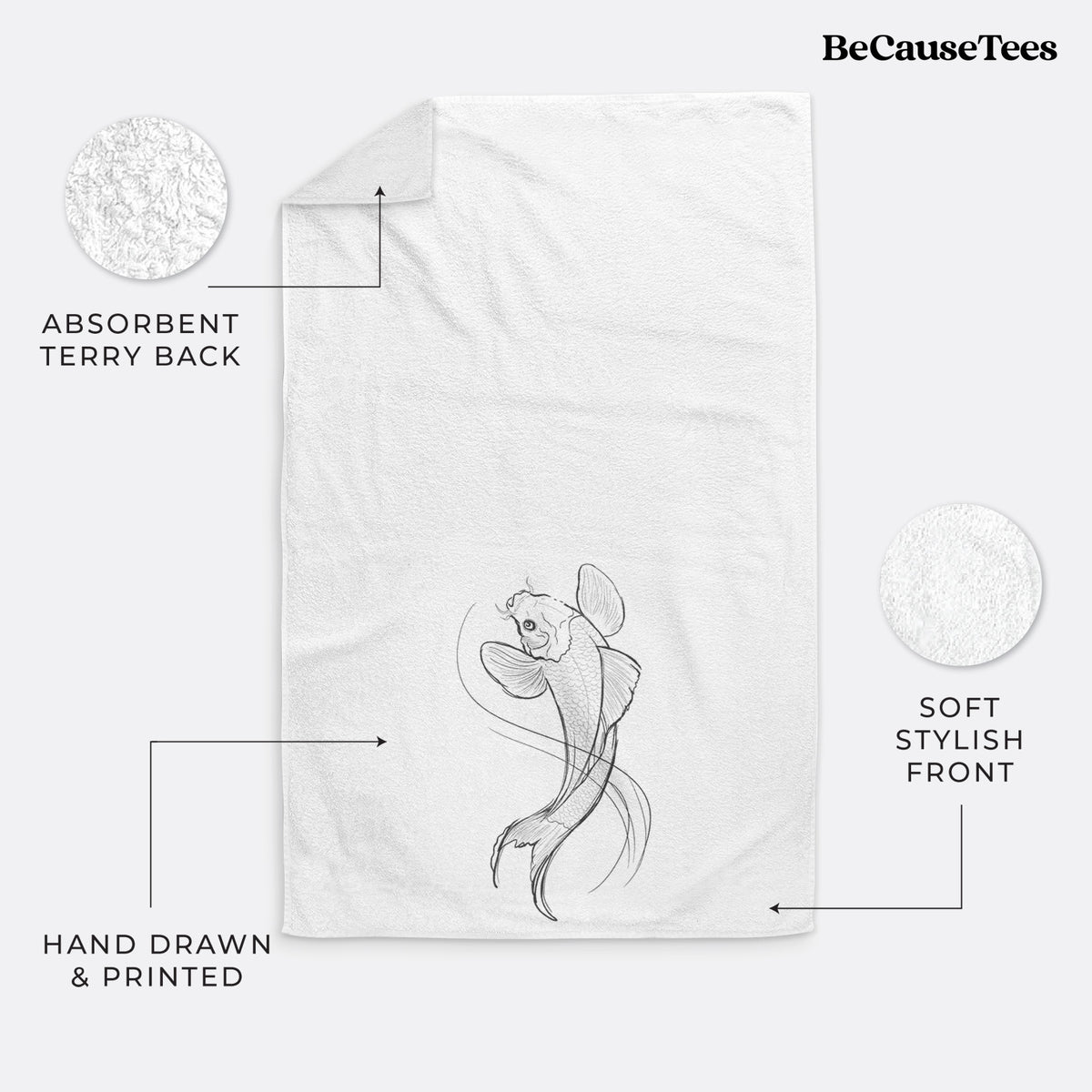 White hand towel printed with a black ink line drawing of a koi fish swimming with flowing fins.