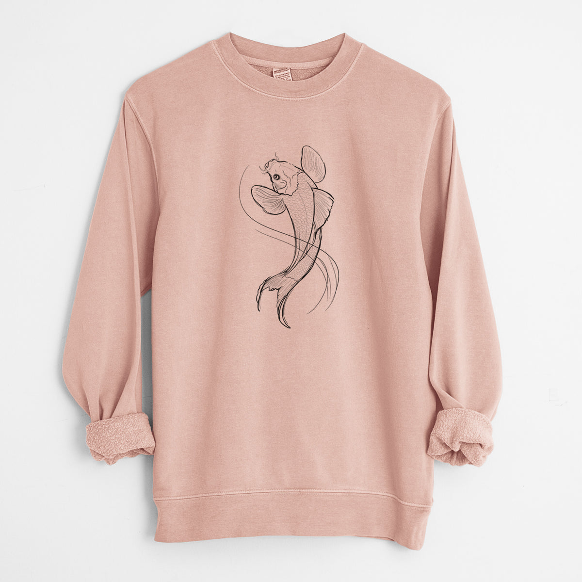 Dusty pink pigment dyed crewneck sweatshirt laid flat with the sleeves rolled, printed with a black ink line drawing of a koi fish swimming with flowing fins.