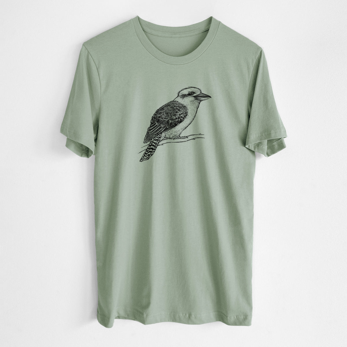 Sage green lightweight cotton t-shirt laid flat, printed with a detailed black ink sketch of a kookaburra perched on a branch.
