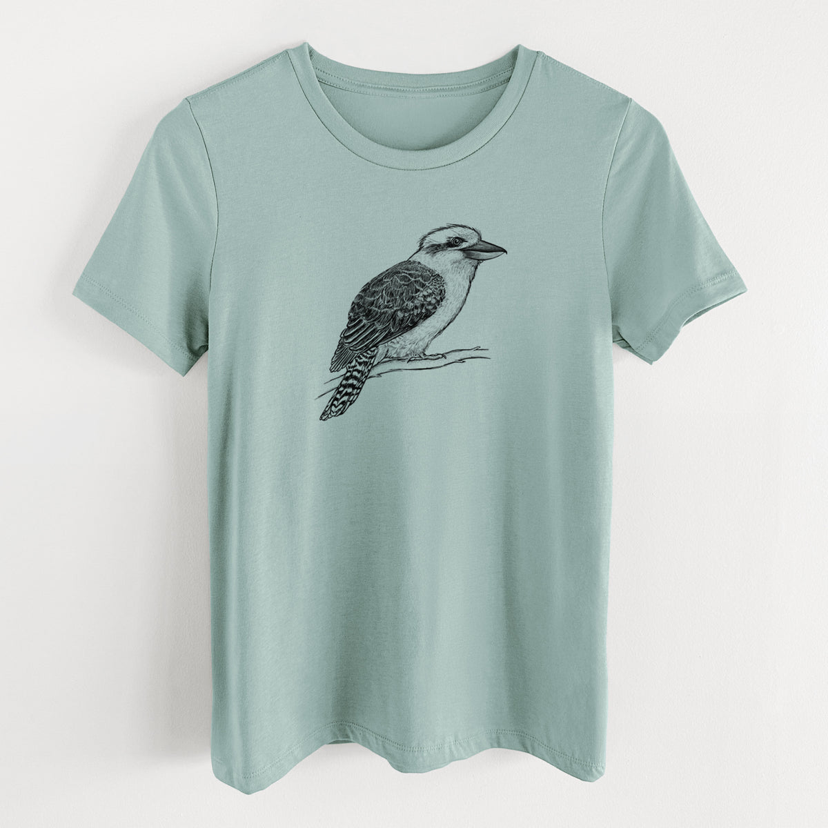 Dusty blue women's relaxed fit cotton t-shirt laid flat, printed with a detailed black ink sketch of a kookaburra perched on a branch.