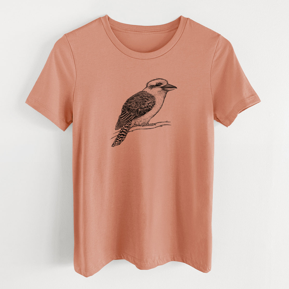 Terracotta orange women's relaxed fit cotton t-shirt laid flat, printed with a detailed black ink sketch of a kookaburra perched on a branch.
