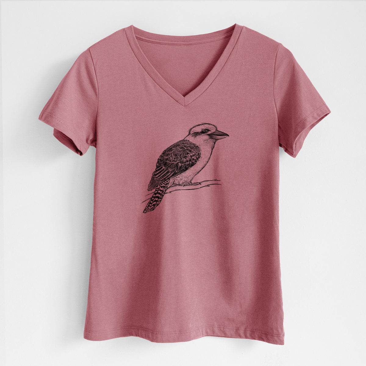 Mauve pink women's relaxed fit cotton V-neck t-shirt laid flat, printed with a detailed black ink sketch of a kookaburra perched on a branch.