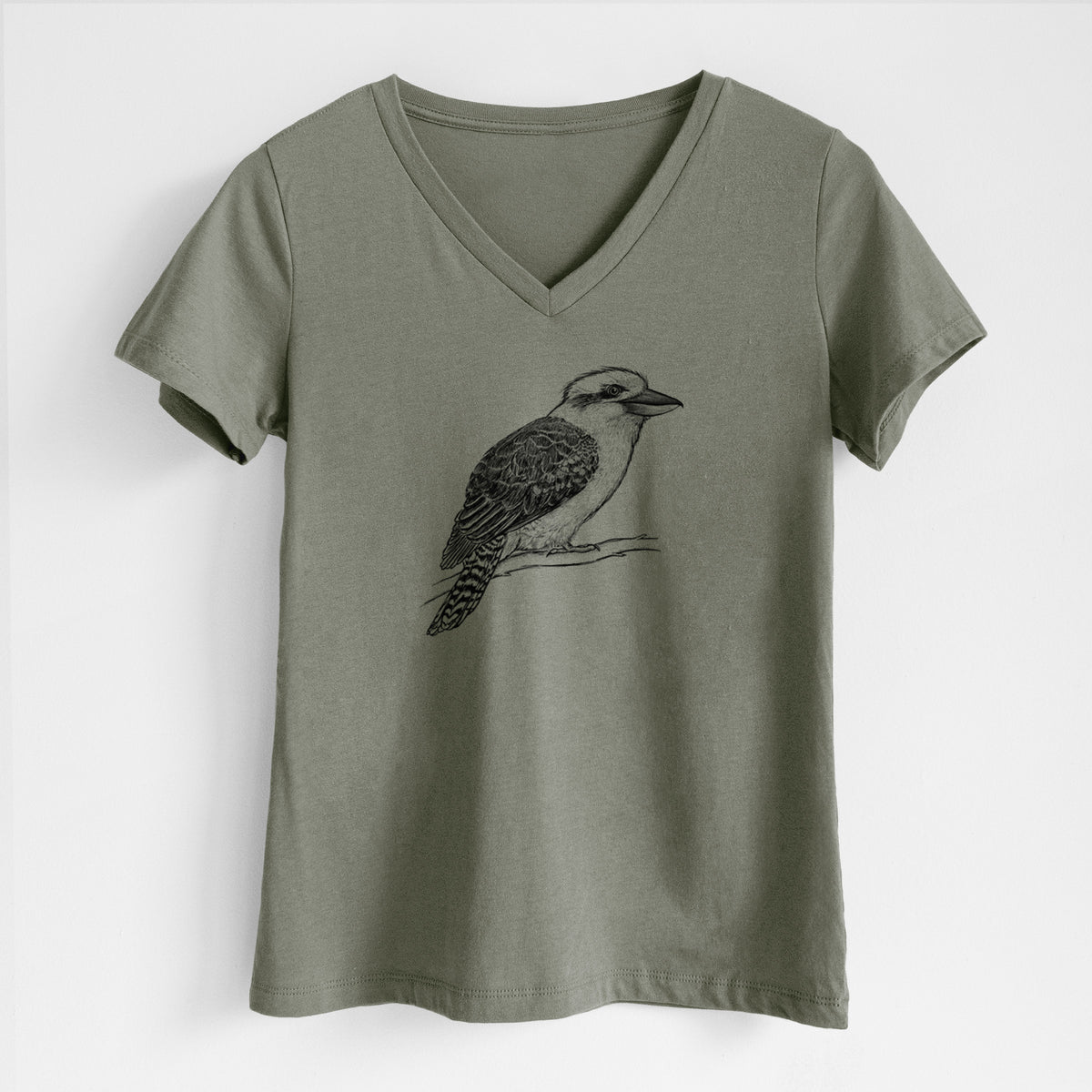Military green women's relaxed fit cotton V-neck t-shirt laid flat, printed with a detailed black ink sketch of a kookaburra perched on a branch.
