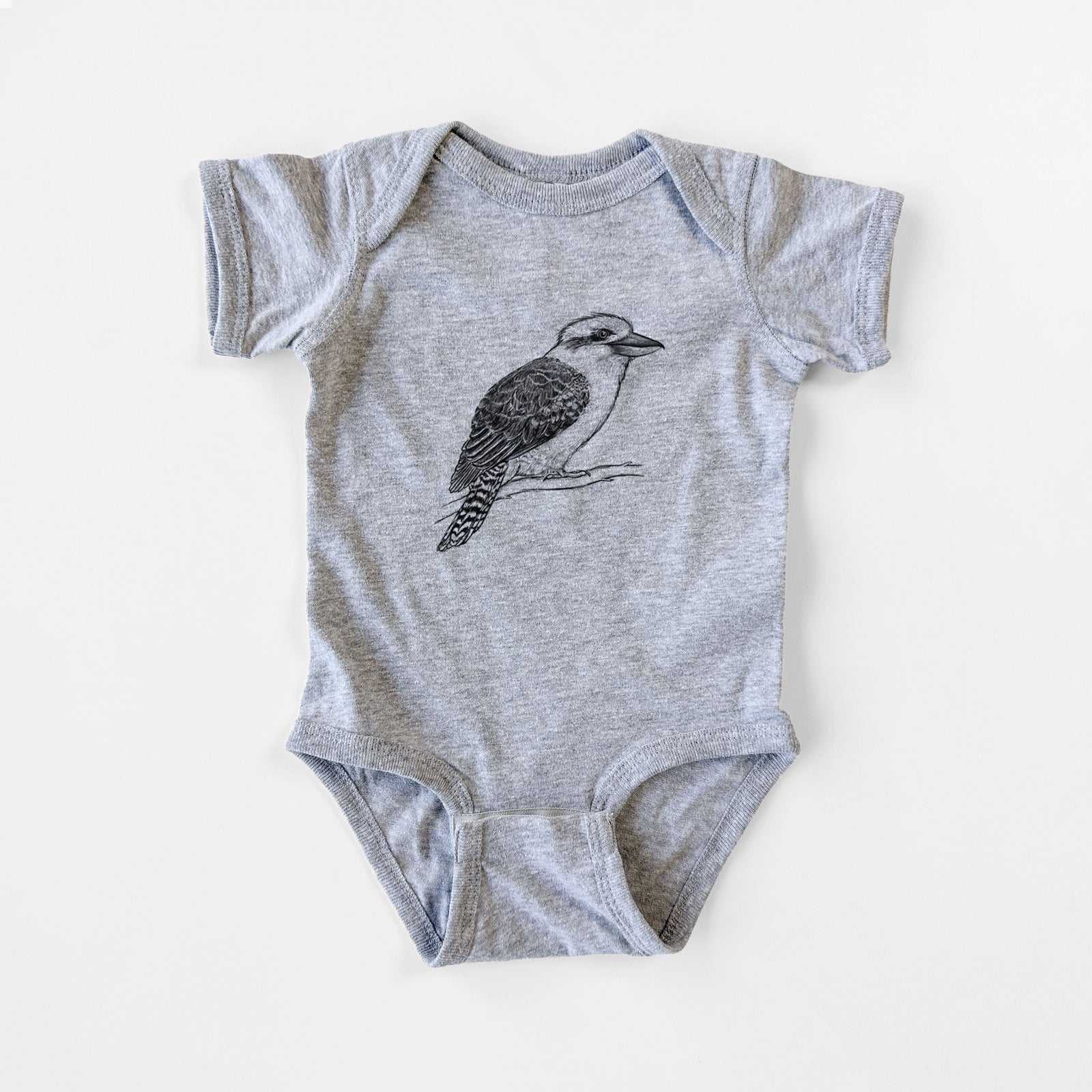 Grey baby bodysuit laid flat, printed with a detailed black ink sketch of a kookaburra perched on a branch.
