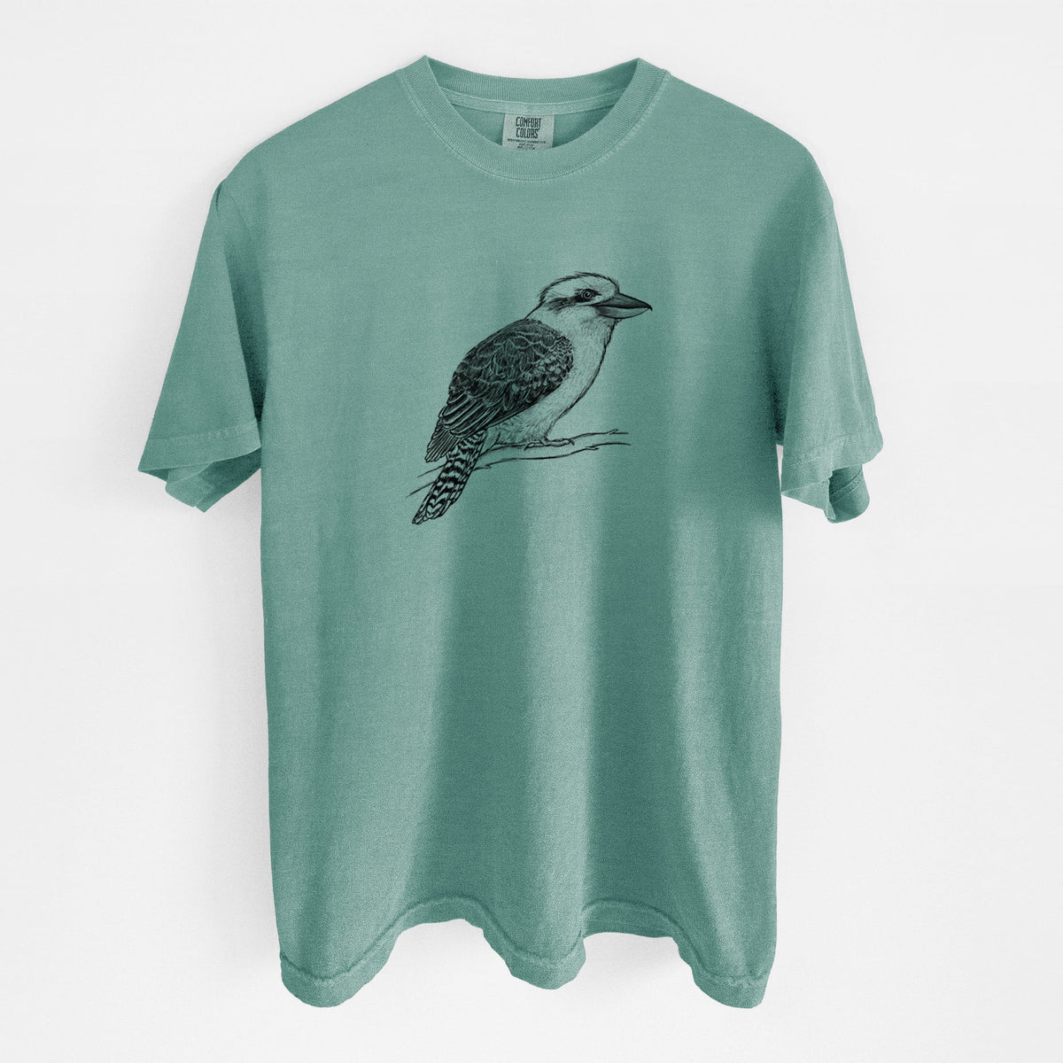 Reef green Comfort Colors t-shirt laid flat, printed with a detailed black ink sketch of a kookaburra perched on a branch.