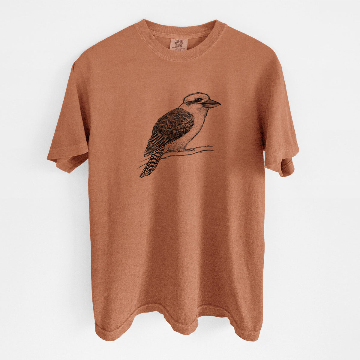 Yam burnt orange Comfort Colors t-shirt laid flat, printed with a detailed black ink sketch of a kookaburra perched on a branch.