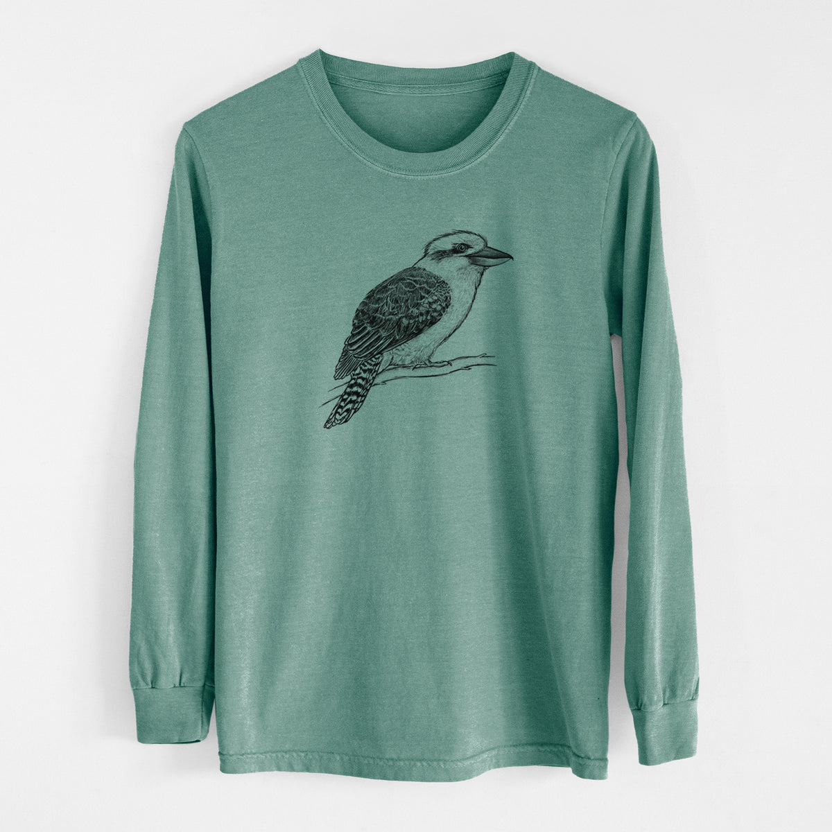Pine green Comfort Colors long sleeve shirt laid flat, printed with a detailed black ink sketch of a kookaburra perched on a branch.