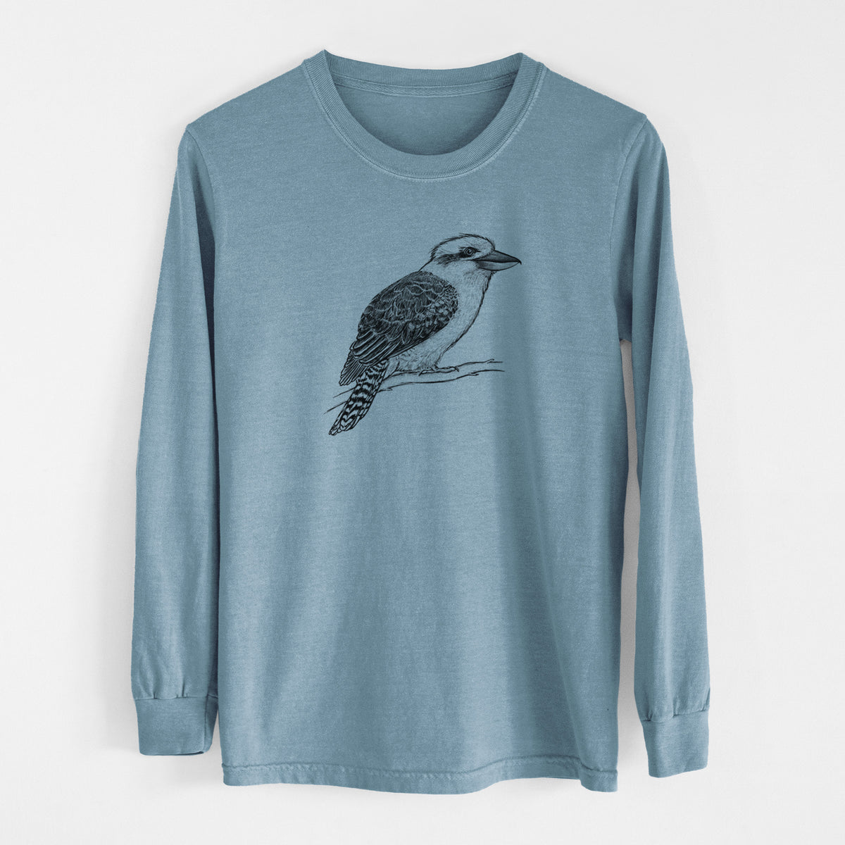 Steel blue Comfort Colors long sleeve shirt laid flat, printed with a detailed black ink sketch of a kookaburra perched on a branch.