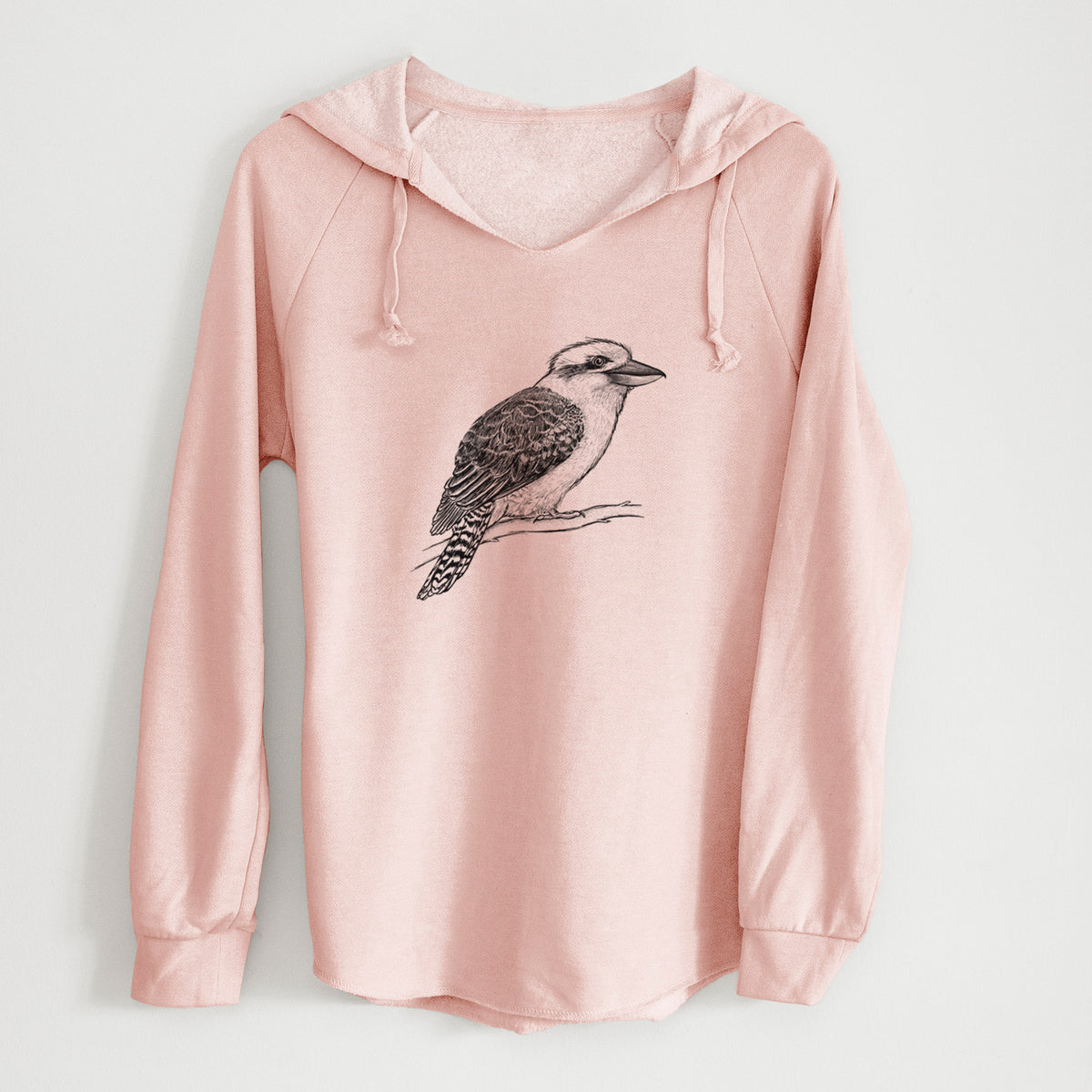 Blush pink women's Cali Wave hooded sweatshirt laid flat, printed with a detailed black ink sketch of a kookaburra perched on a branch.
