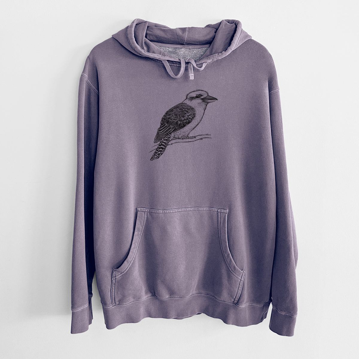 Plum purple pigment dyed hoodie laid flat, printed with a detailed black ink sketch of a kookaburra perched on a branch.