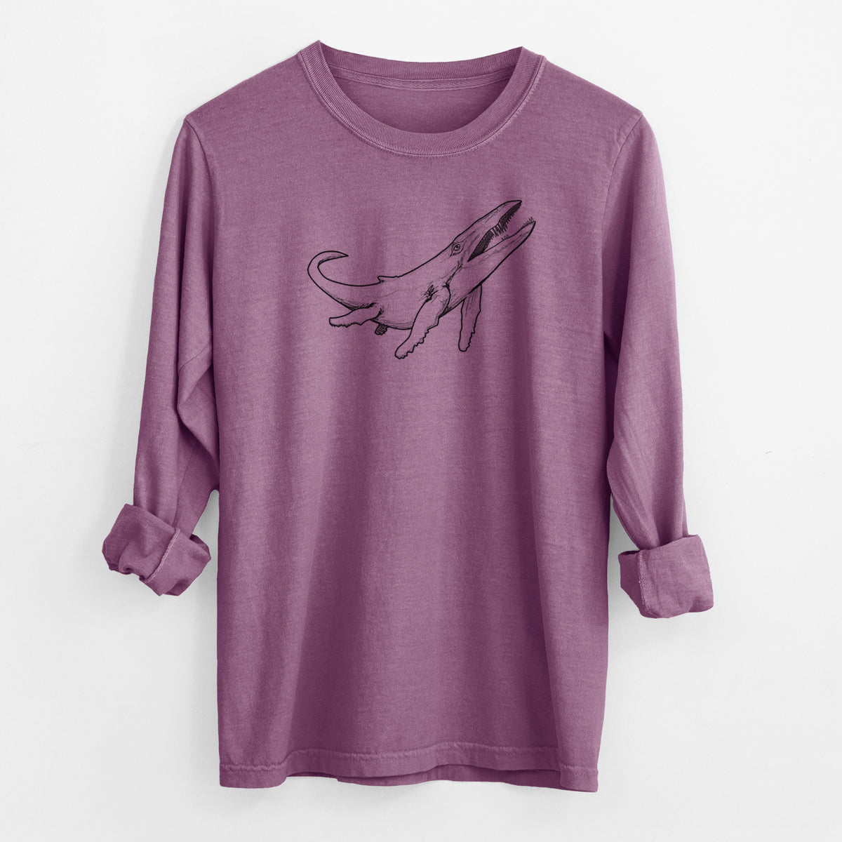 Berry pink Comfort Colors long sleeve shirt laid flat with the cuffs rolled, printed with a black ink illustration of a Kronosaurus marine reptile swimming.