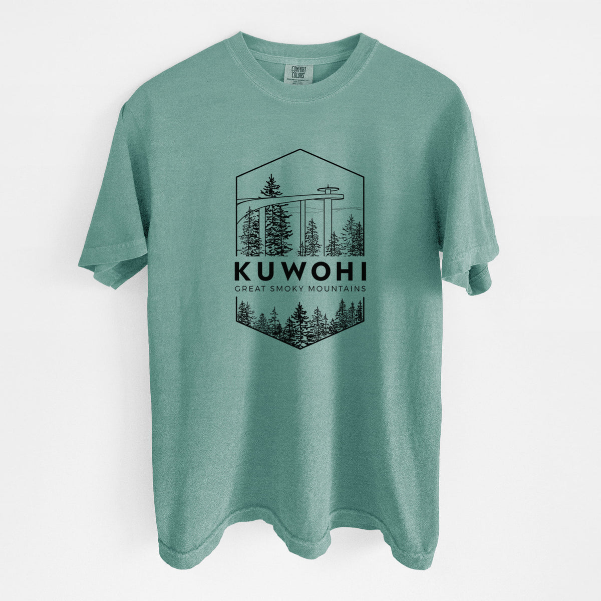 Reef green Comfort Colors t-shirt laid flat, printed with a black line art badge of the Kuwohi observation tower above pine trees, with the words Kuwohi, Great Smoky Mountains.