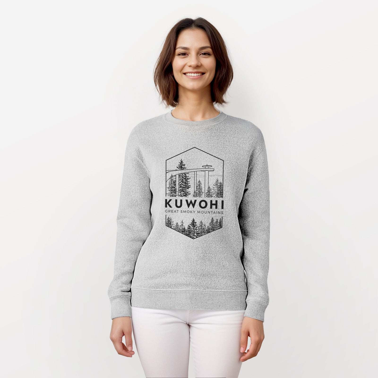 Salt and pepper knit sweatshirt laid flat, printed with a black line art badge of the Kuwohi observation tower above pine trees, with the words Kuwohi, Great Smoky Mountains.