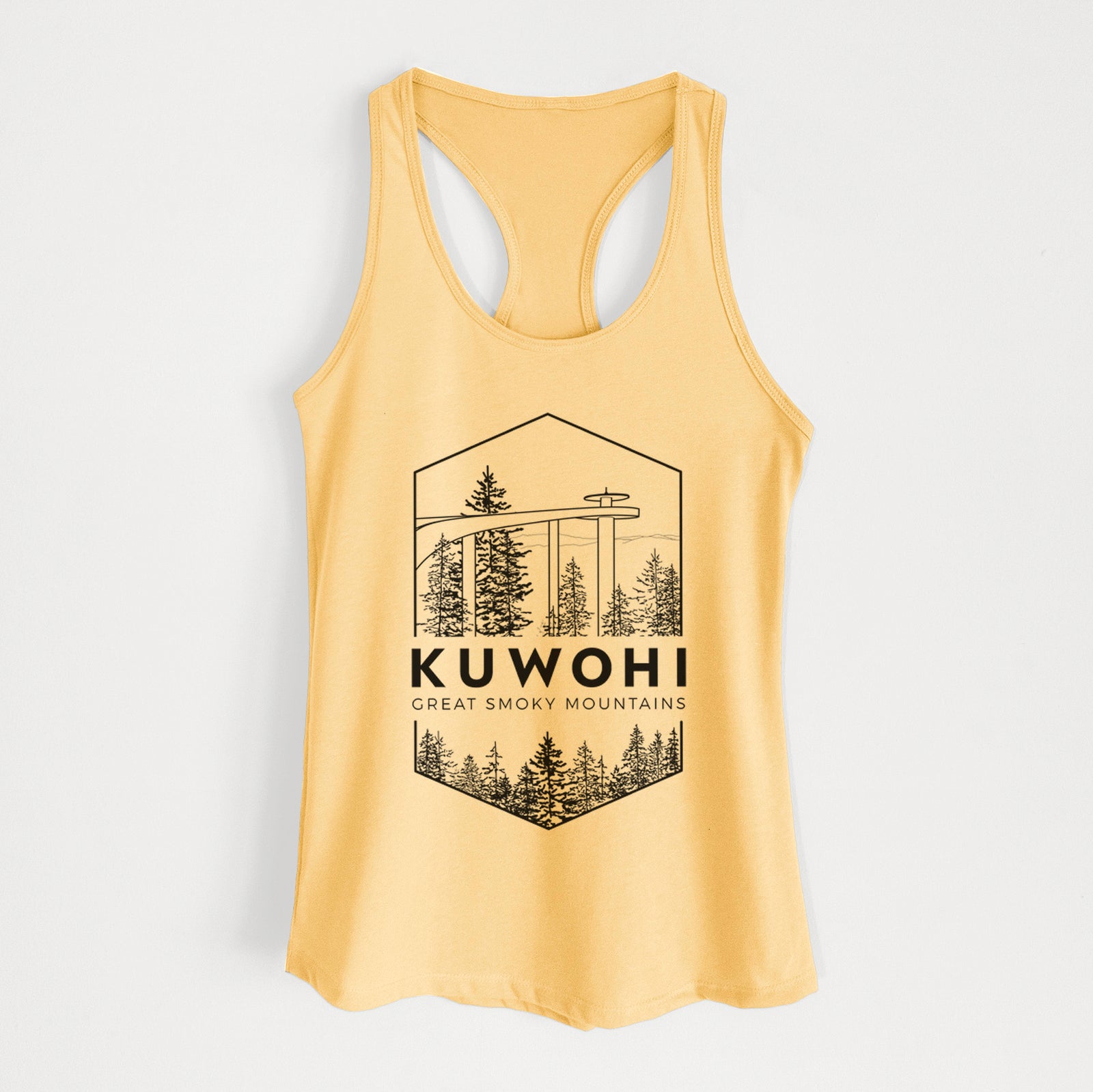 Banana cream women's racerback tank top laid flat, printed with a black line art badge of the Kuwohi observation tower above pine trees, with the words Kuwohi, Great Smoky Mountains.