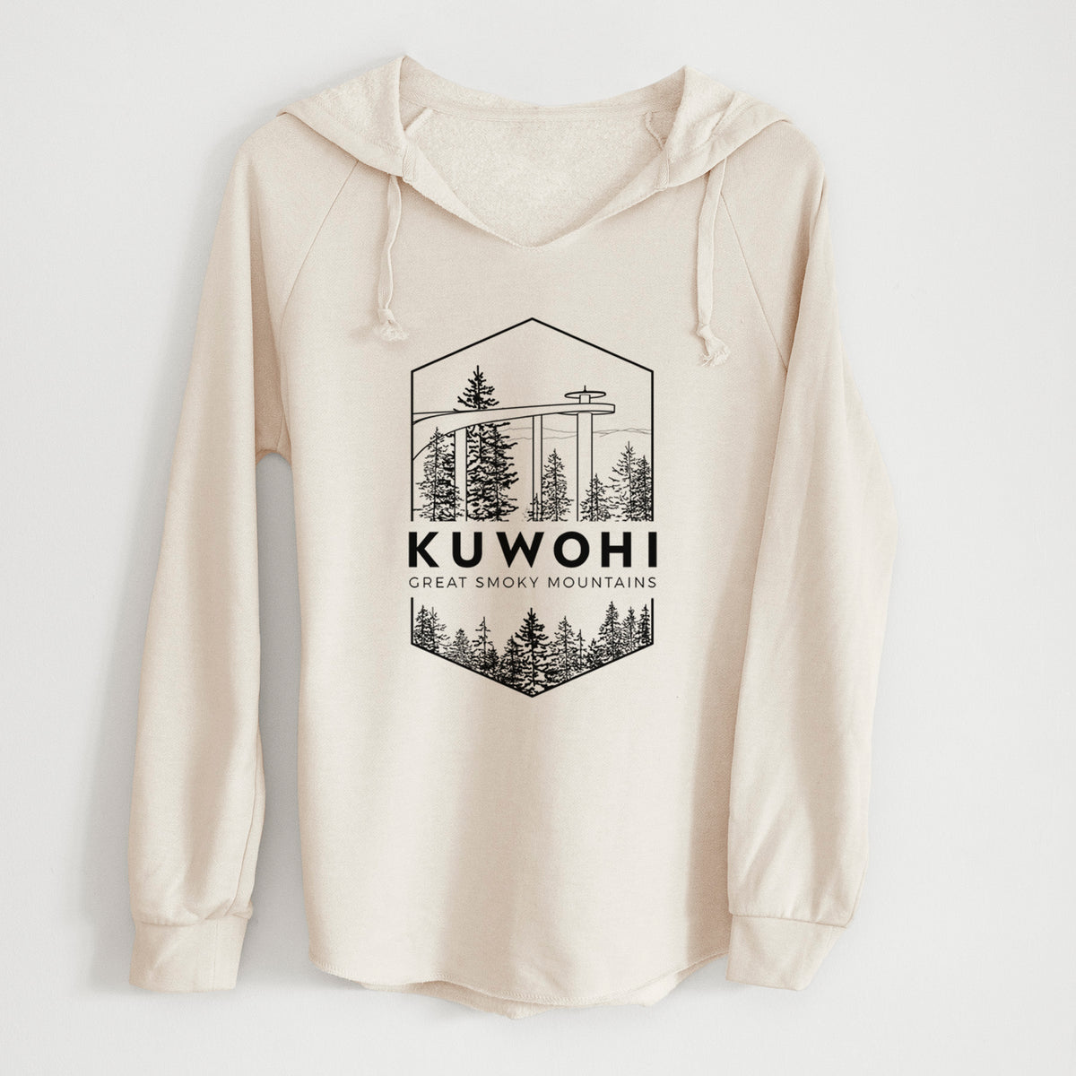 Bone cream women's Cali Wave hooded sweatshirt laid flat, printed with a black line art badge of the Kuwohi observation tower above pine trees, with the words Kuwohi, Great Smoky Mountains.