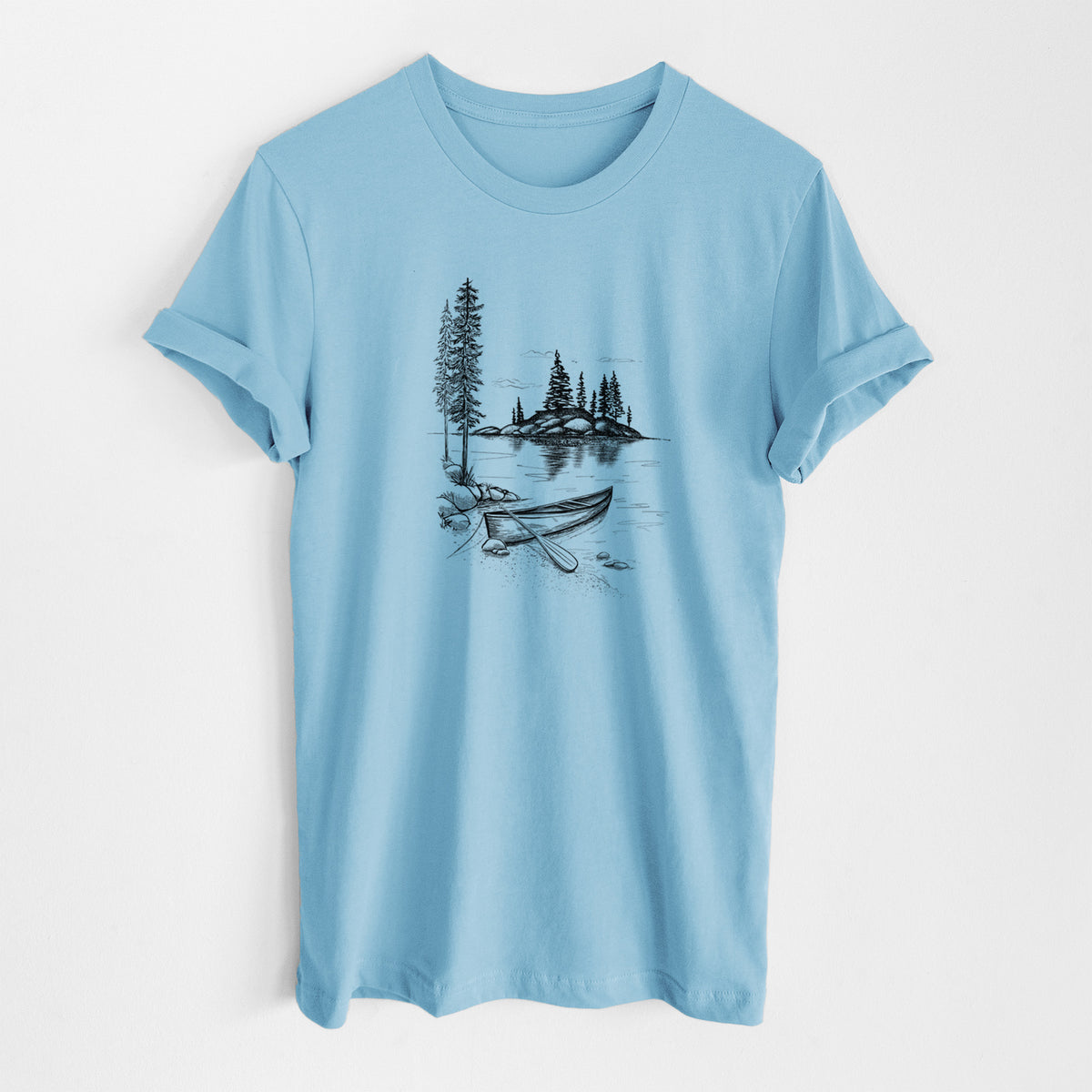 Ocean blue lightweight cotton t-shirt laid flat, printed with a black ink illustration of a canoe resting on the shore of a lake with pine trees on a small island.
