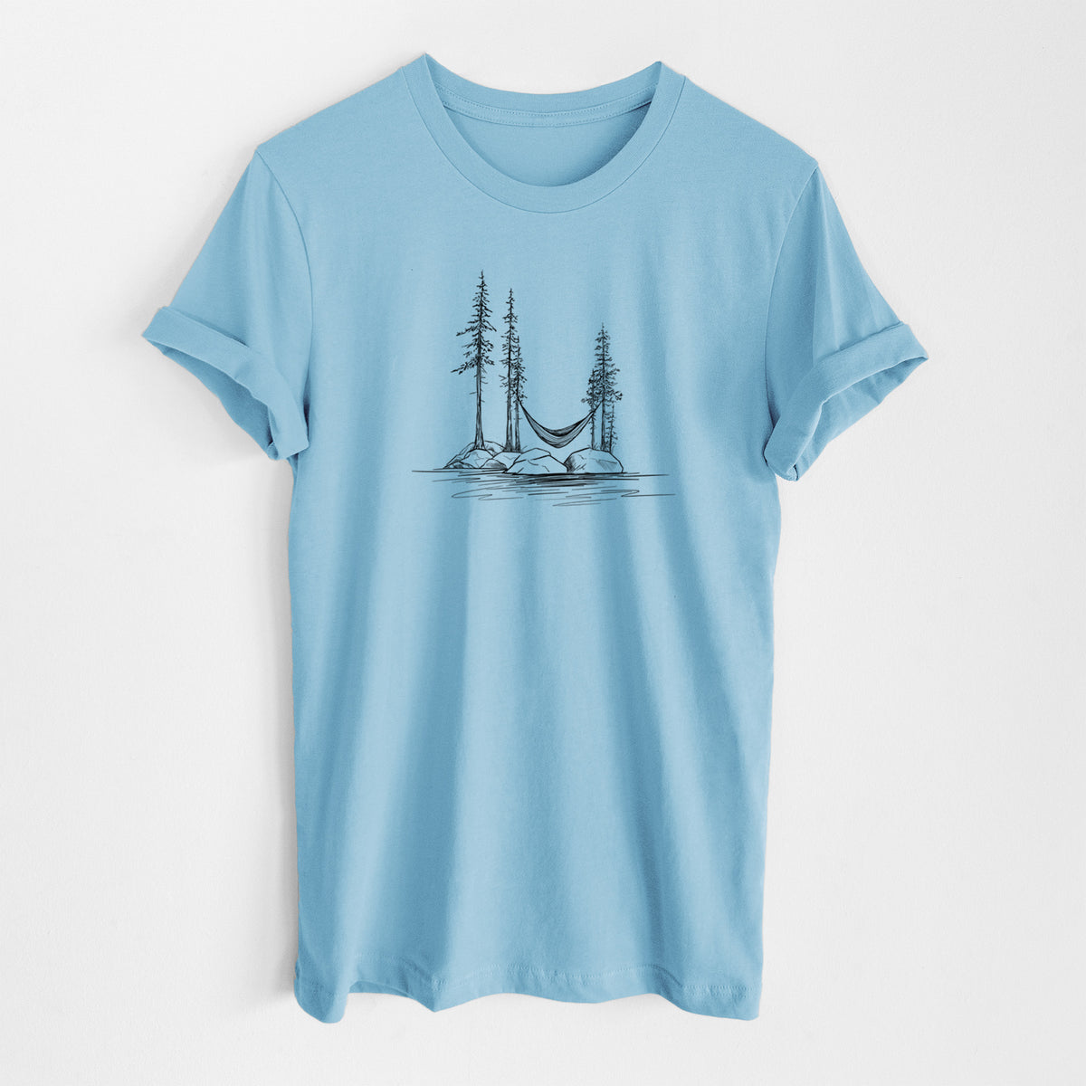 Ocean blue lightweight cotton t-shirt laid flat, printed with a black ink illustration of a hammock strung between pine trees on a small lakeside island.