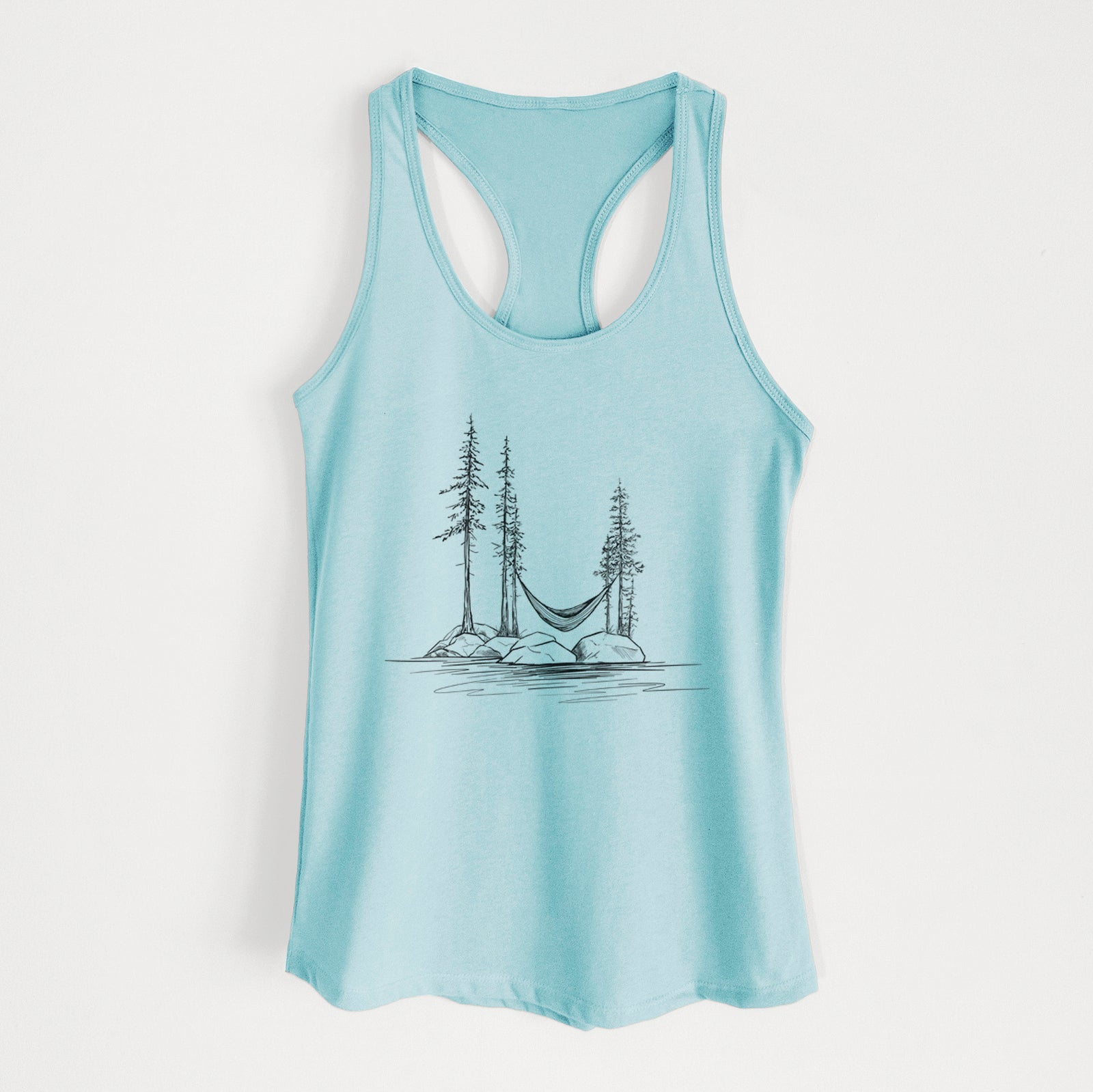 Banana cream women's racerback tank top laid flat, printed with a black ink illustration of a hammock strung between pine trees on a small lakeside island.