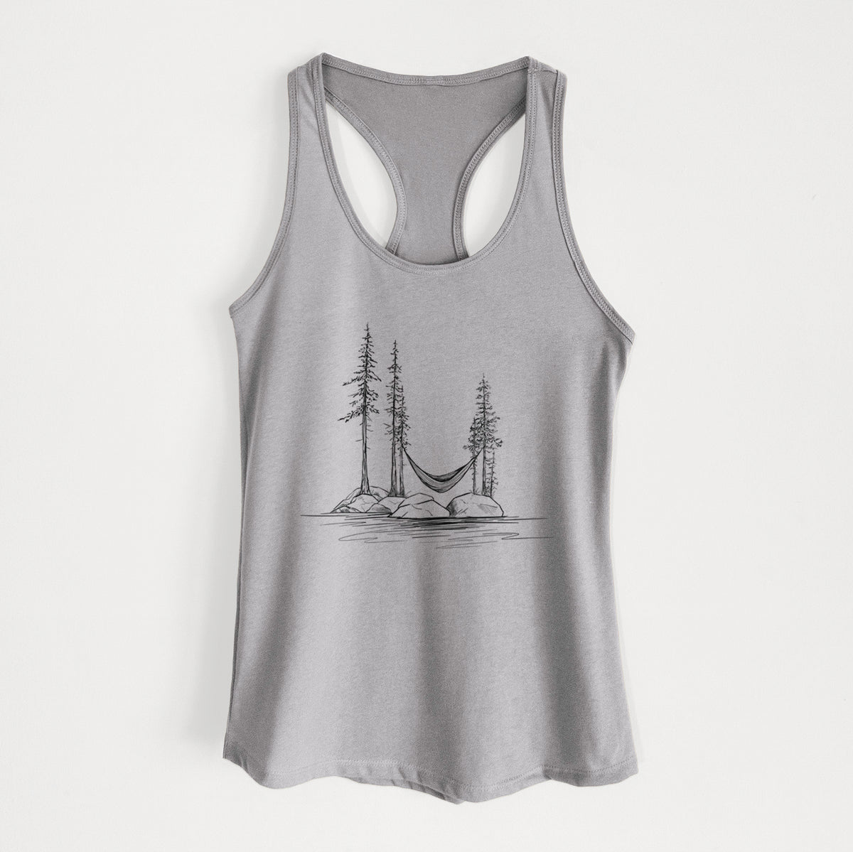 Heather grey women's racerback tank top laid flat, printed with a black ink illustration of a hammock strung between pine trees on a small lakeside island.