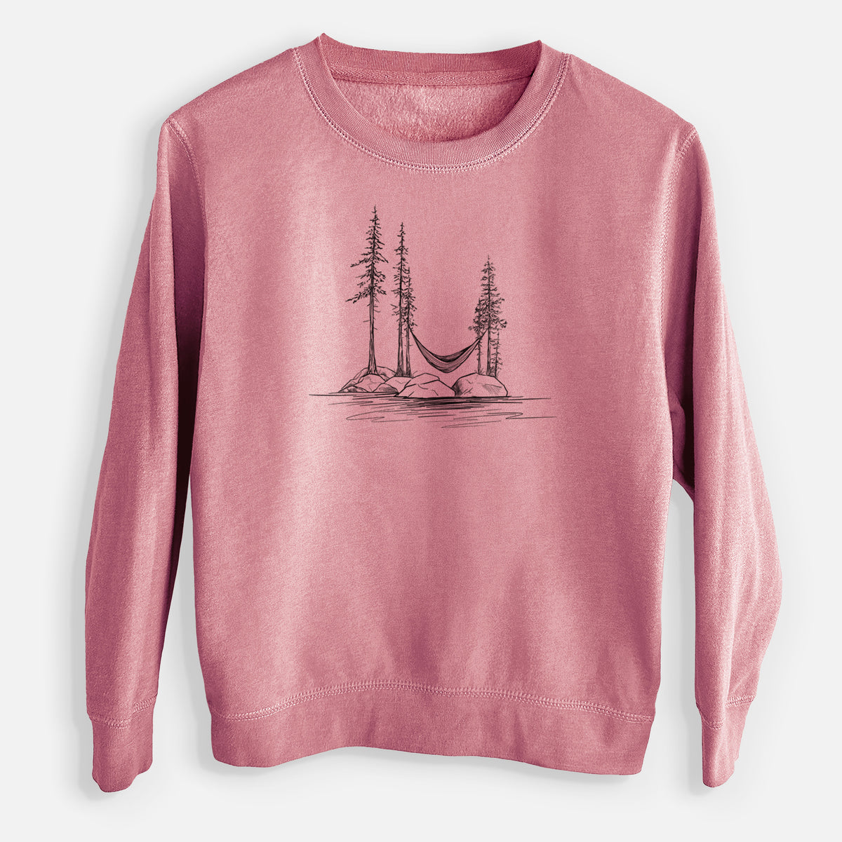 Mauve pink youth crewneck sweatshirt laid flat, printed with a black ink illustration of a hammock strung between pine trees on a small lakeside island.