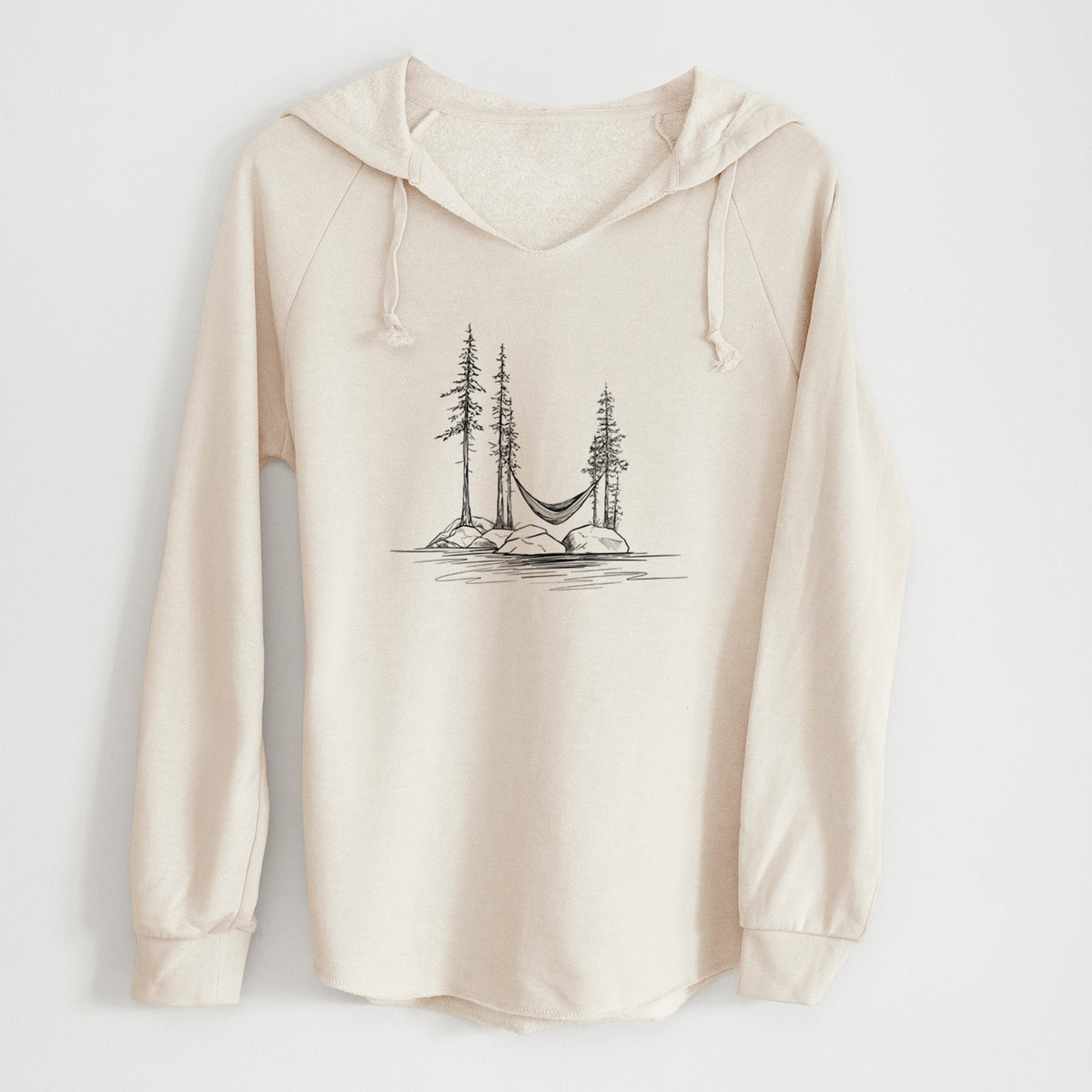 Bone cream women's Cali Wave hooded sweatshirt laid flat, printed with a black ink illustration of a hammock strung between pine trees on a small lakeside island.