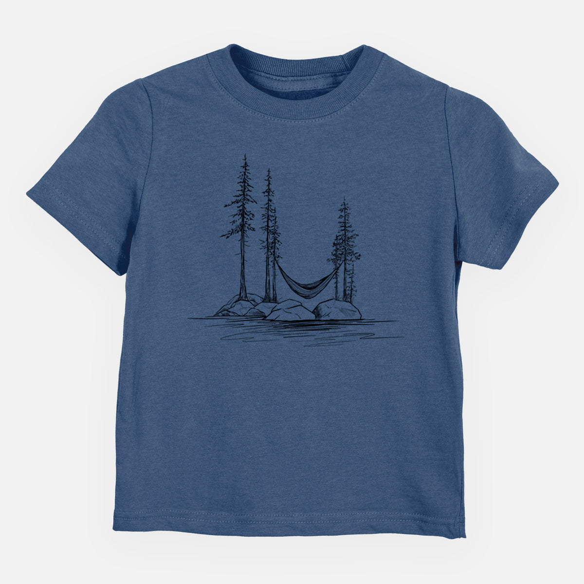 Indigo blue toddler t-shirt laid flat, printed with a black ink illustration of a hammock strung between pine trees on a small lakeside island.