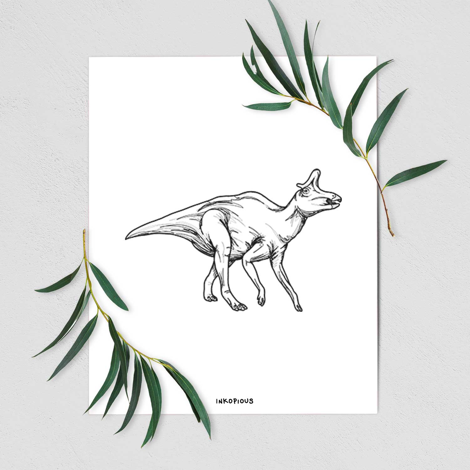 Art print of a black ink illustration of a crested Lambeosaurus walking, shown with eucalyptus leaves.