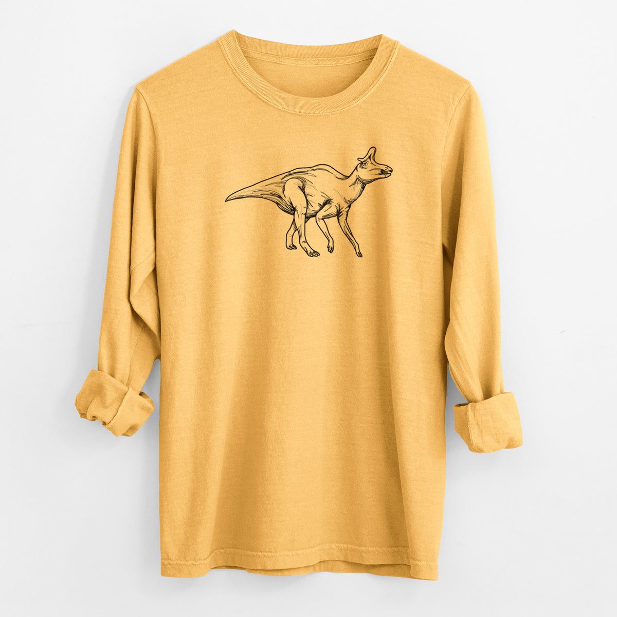 Golden wheat yellow Comfort Colors long sleeve shirt laid flat with the cuffs rolled, printed with a black ink illustration of a crested Lambeosaurus walking.